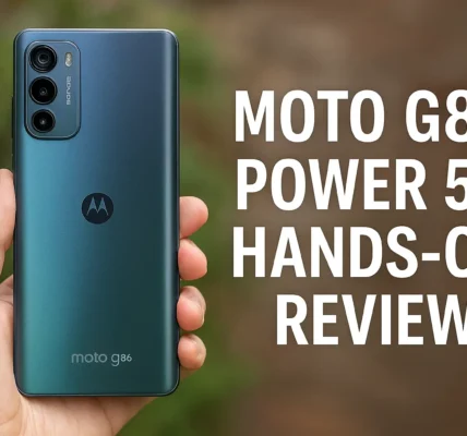 Person holding Moto G86 Power 5G smartphone in metallic green finish with triple camera setup – hands-on review background