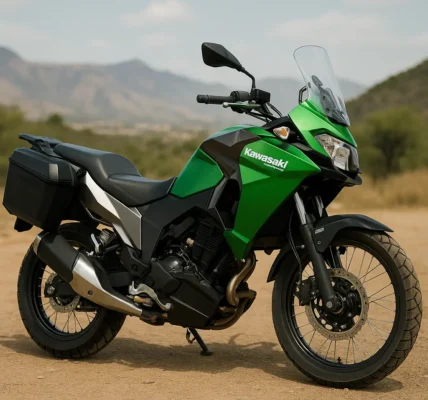 Kawasaki Versys-X 300 adventure bike parked in a scenic landscape with mountains in the background