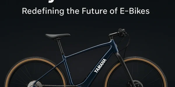Yamaha Electric Cycle 2025 sleek navy blue e-bike with alloy frame, gravel tires, and advanced center-drive motor displayed on a dark background.