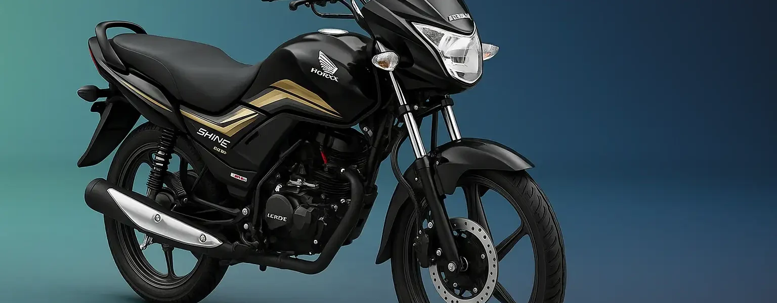 Honda Shine 2025 commuter bike in black with golden graphics, fuel-efficient 125cc motorcycle designed for Indian riders